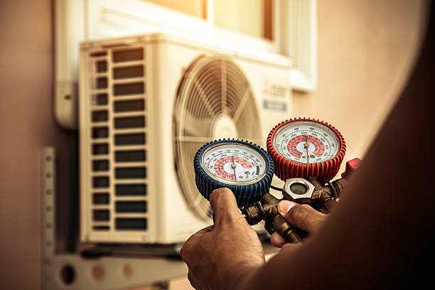 Professional Air Conditioning Service technician working in Clearwater Beach, FL